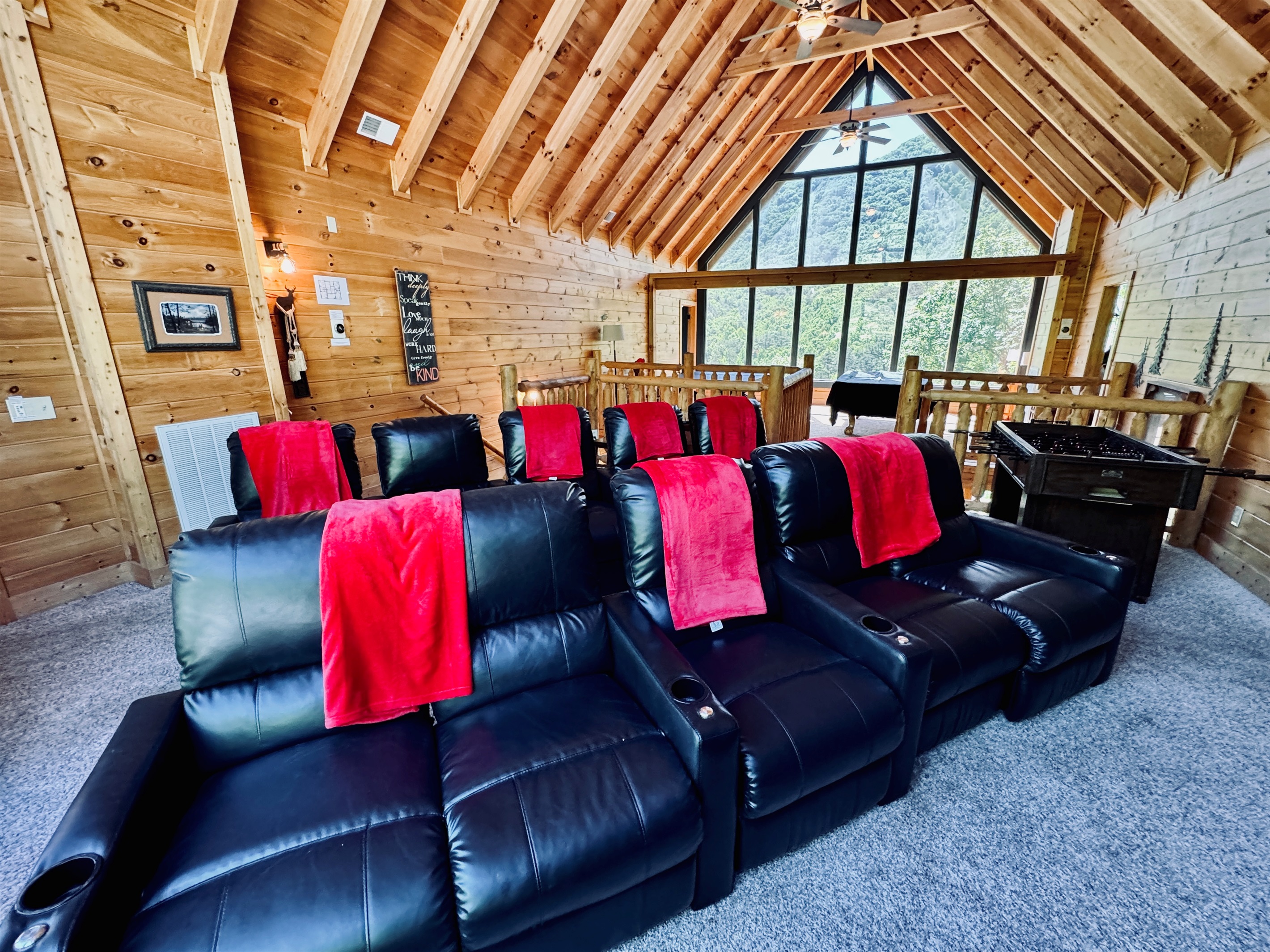 Dramatic soaring ceilings and theater seating for 10.