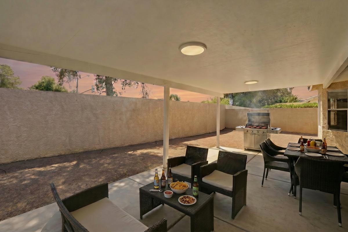 Covered patio and BBQ area with outdoor dining. Awesome for families, friends, remote workers, business acquaintances. So quiet and peaceful, relax from a long day of travel or activities. 