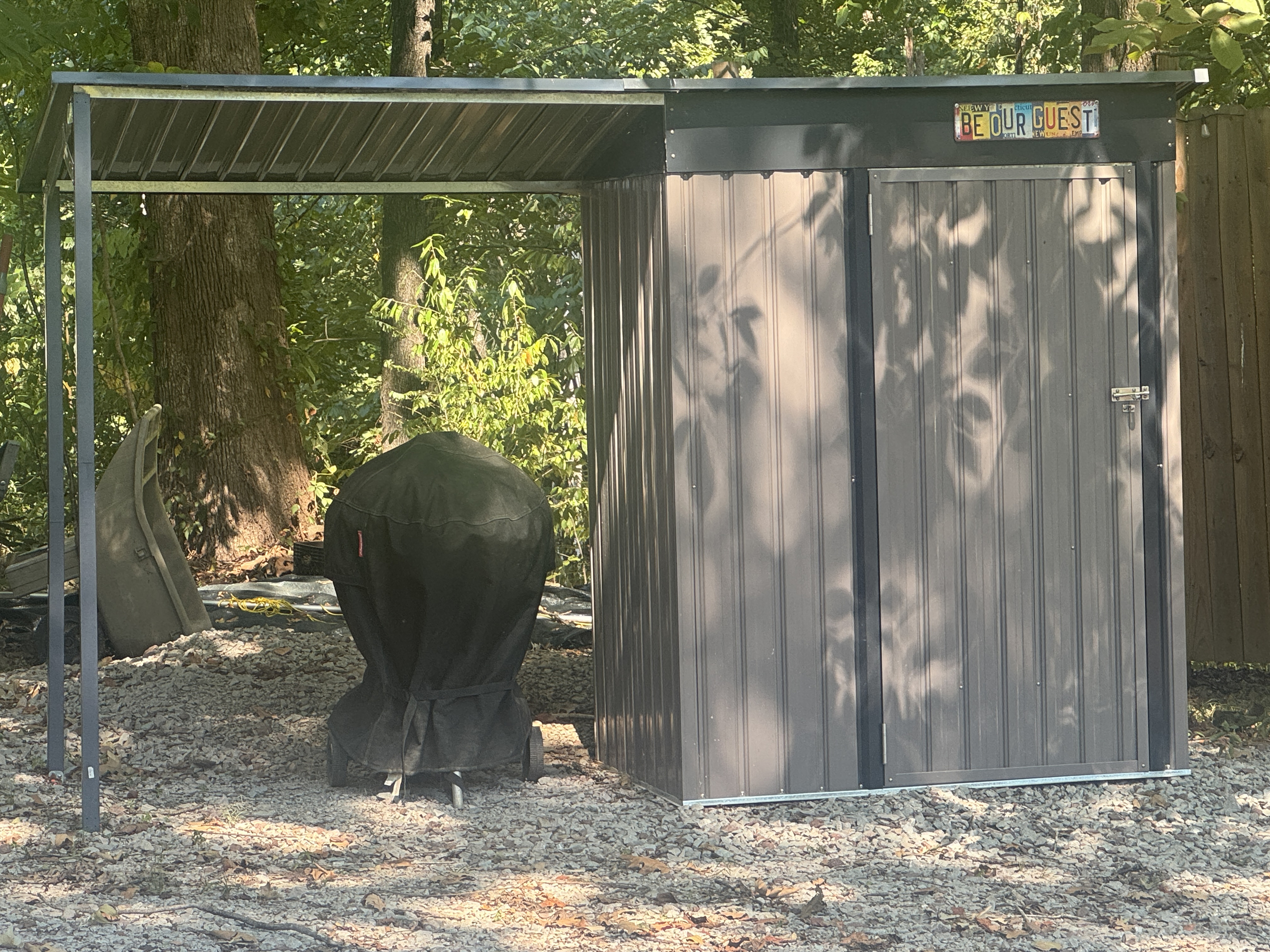 Charcoal grill and shed with fishing gear and other supplies for guests to use during their stay!