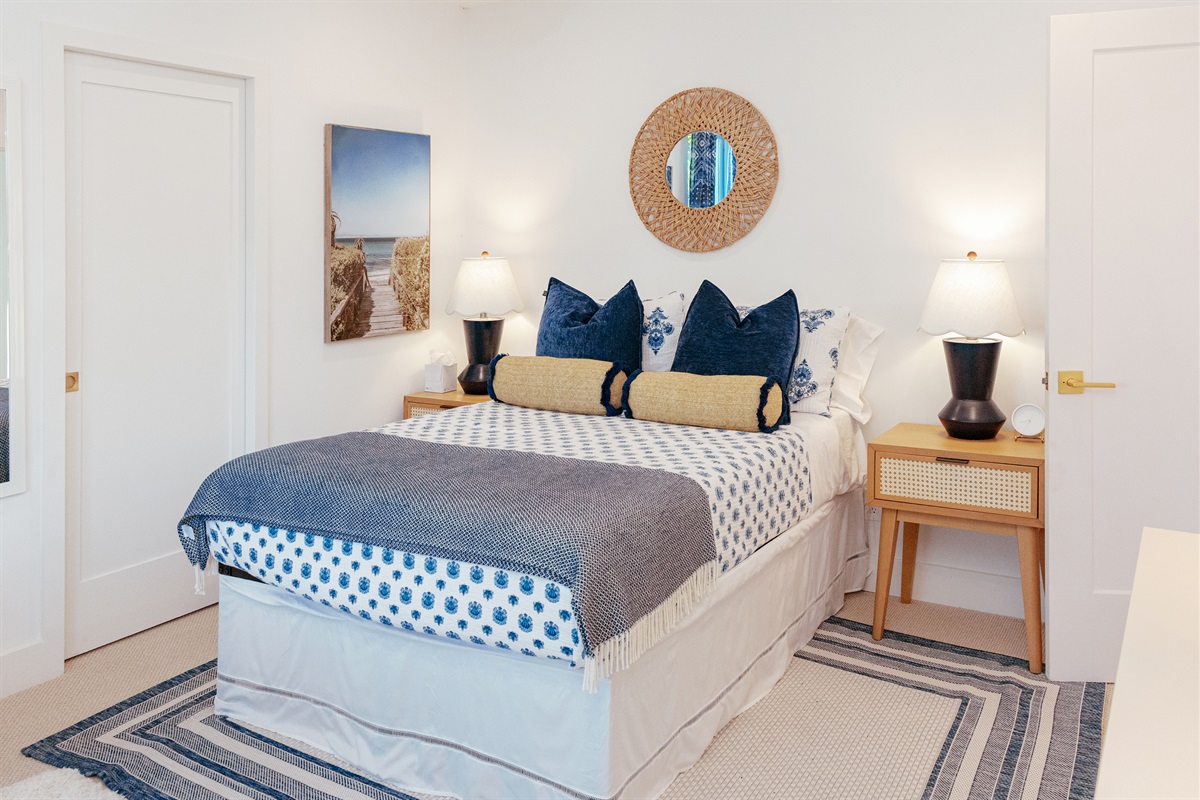 The second bedroom is next to the main bedroom, continuing the them of high design with a bonus additional seating area with plenty of space.