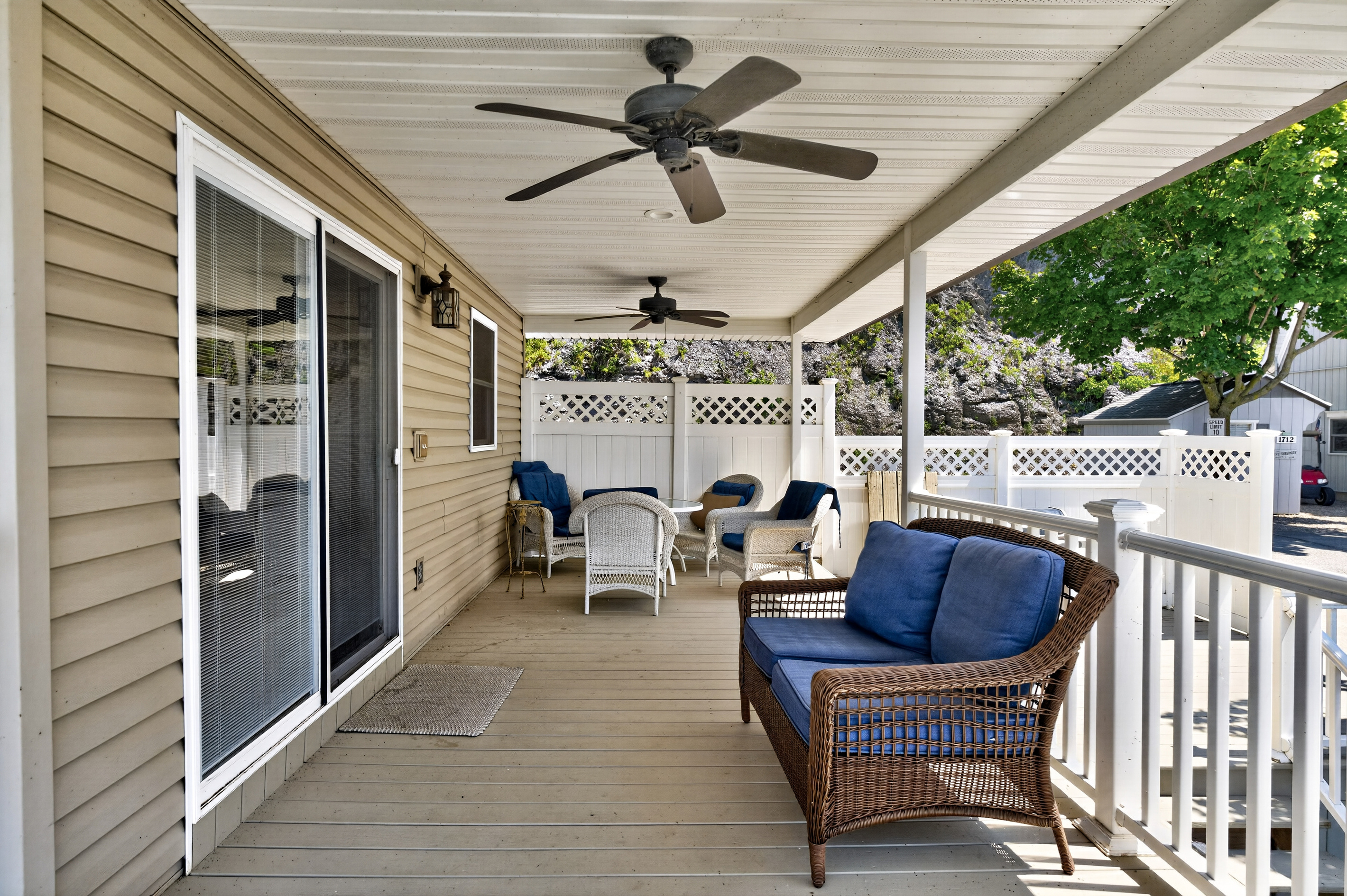 Porch seating beside the sliding door