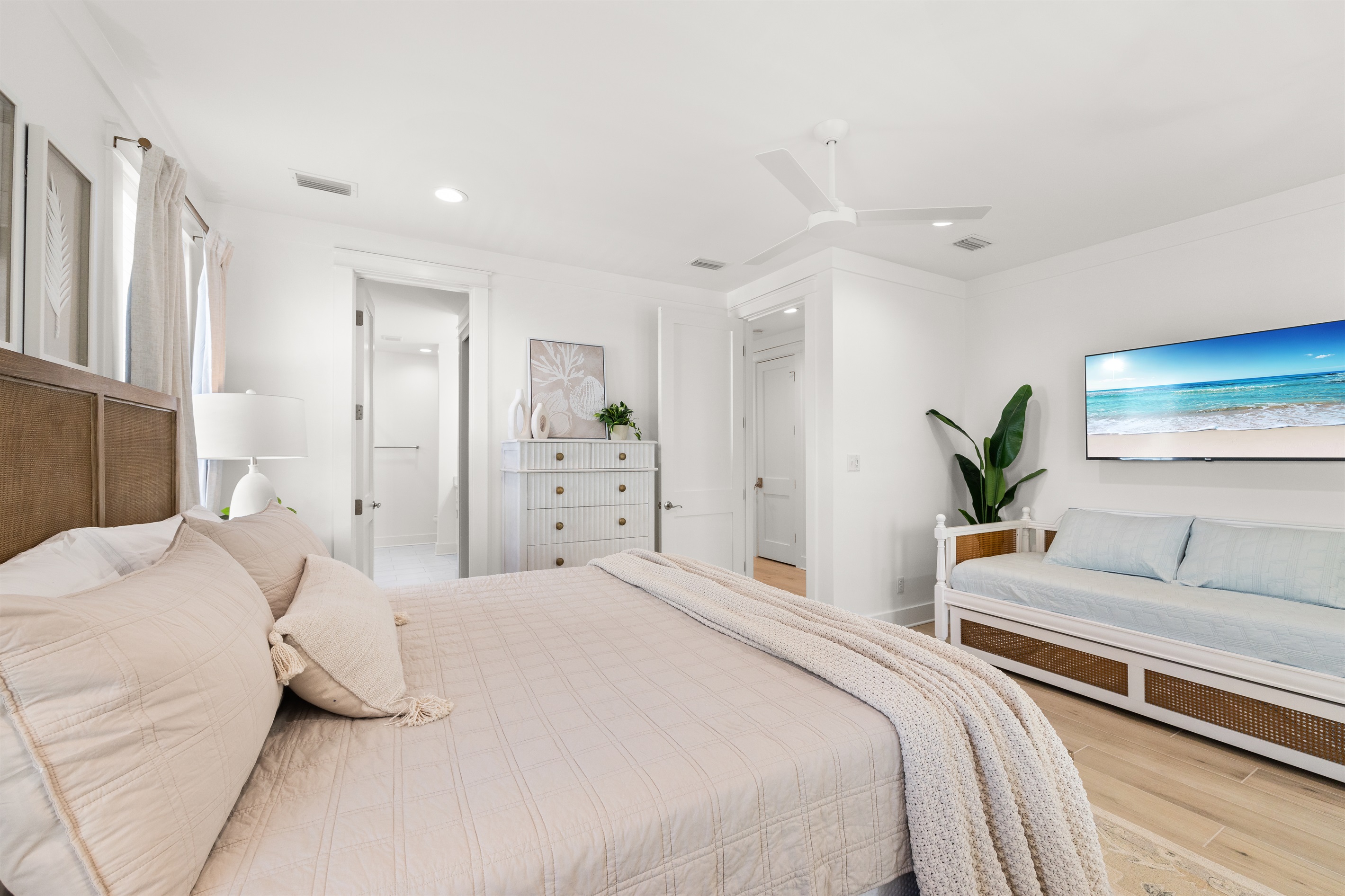 Designed for relaxation, this inviting bedroom features comfortable furnishings and a bright, coastal atmosphere.  Includes daybed and trundle.