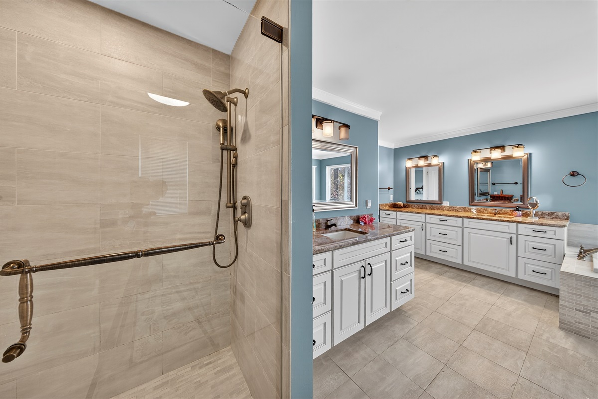 Multiple vanities and a spacious layout for hotel-style comfort.