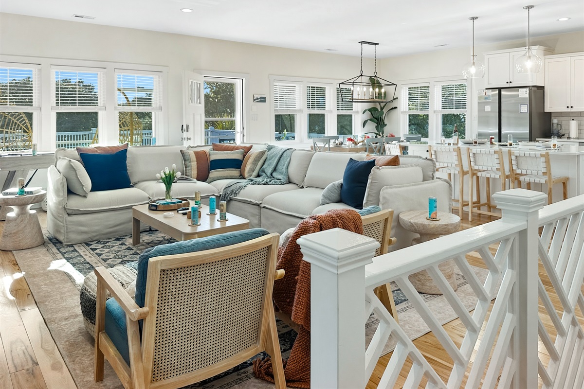 The lovely open living room has lots of space and light.