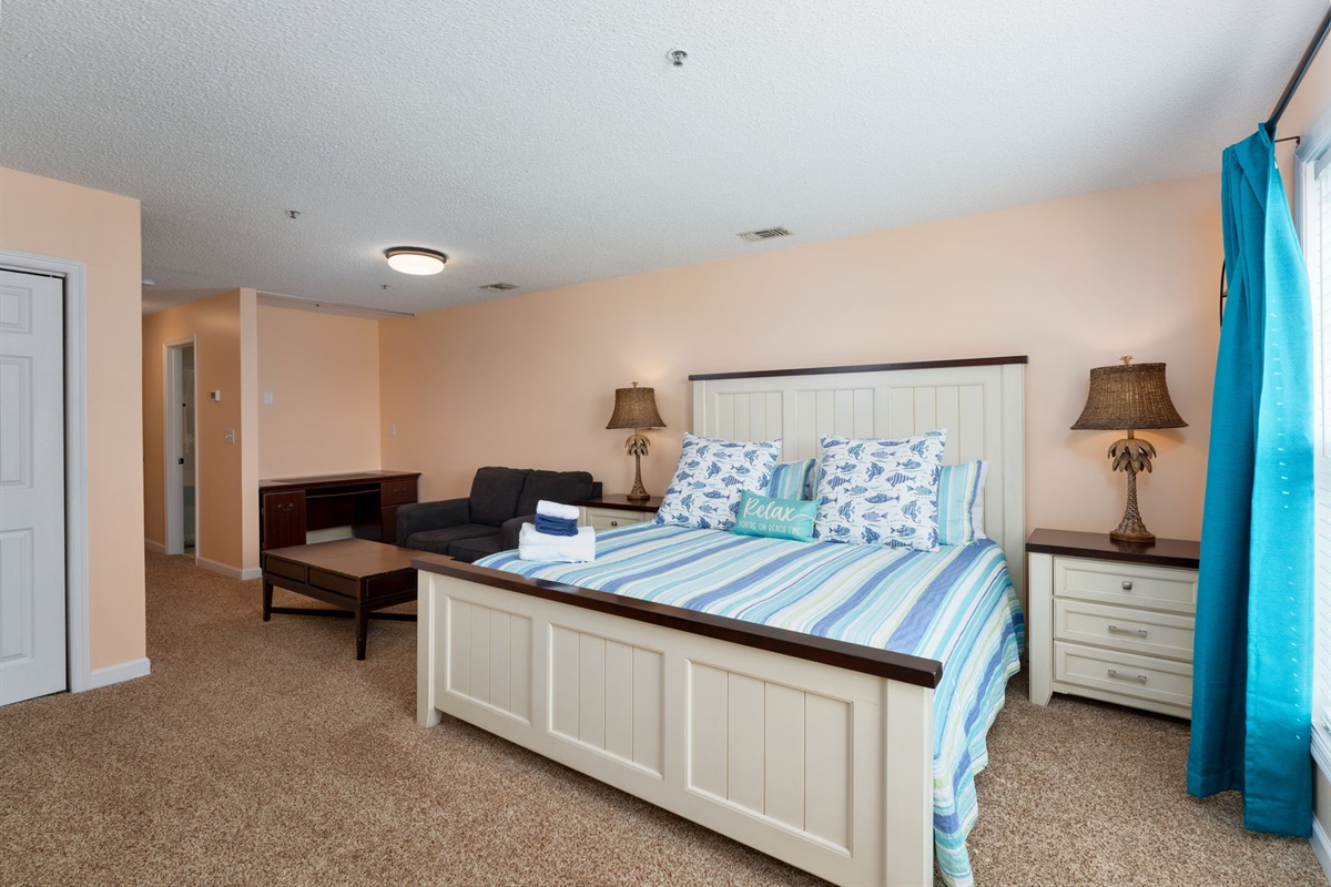 King-size bed in Bedroom 1