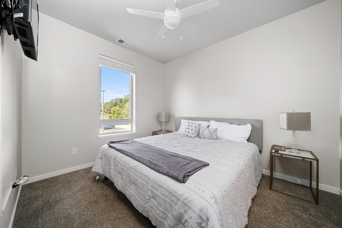 Queen bedroom with clean linens
