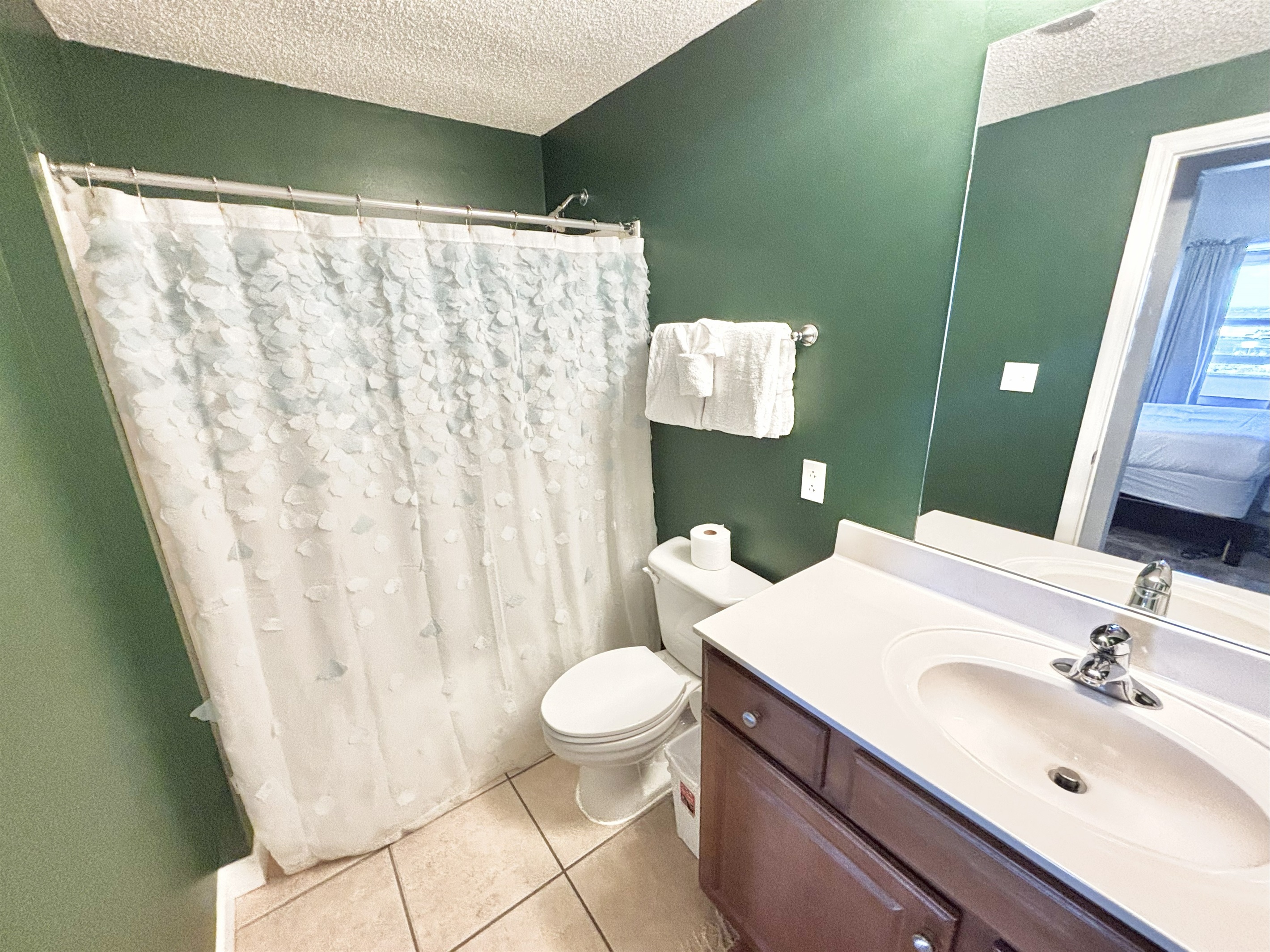 Master bathroom with tub/shower combo