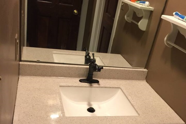 2nd Bathroom (2nd Floor) 2nd Sink which is separated by a door from the other sink & shower so folks can use this while someone else is in the shower.