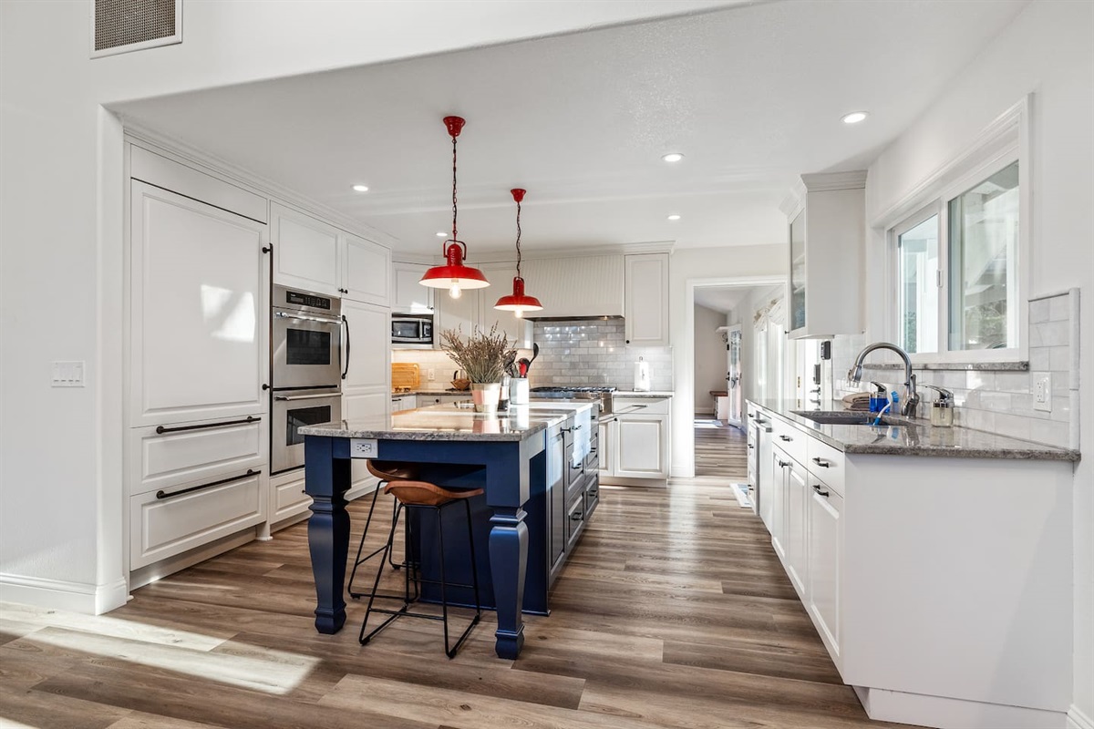 Completely remodeled kitchen with new appliances, double oven, 6 burner stove top, and very large refrigerator.