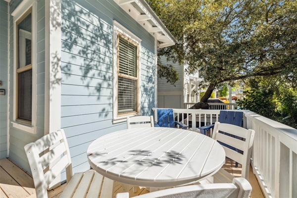 Backyard deck with outdoor dining seating