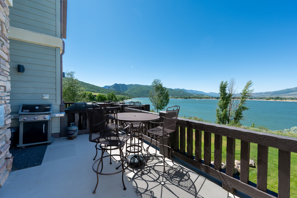 Private deck overlooking Pineview Reservoir, perfect for outdoor dining and morning coffee.