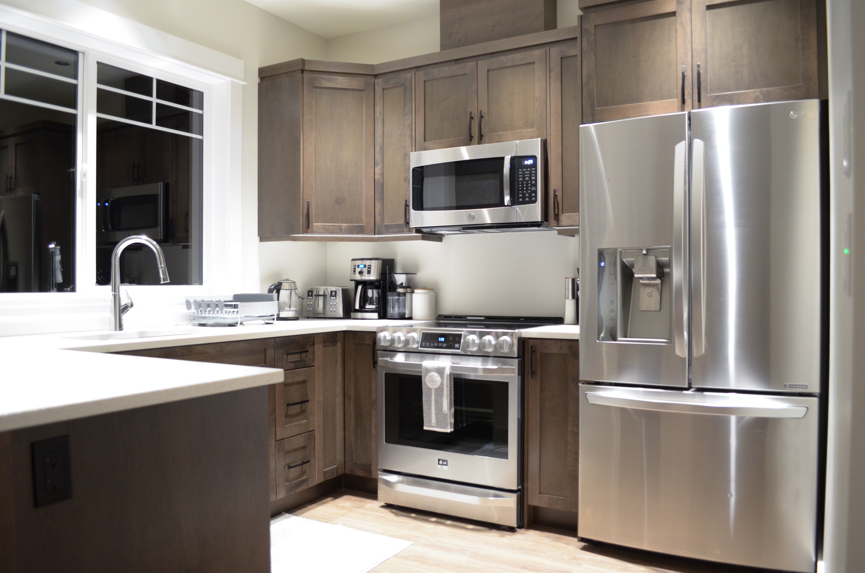 Well-stocked 2nd floor kitchen with cookware for a great family meal after a day on the mountain. 
