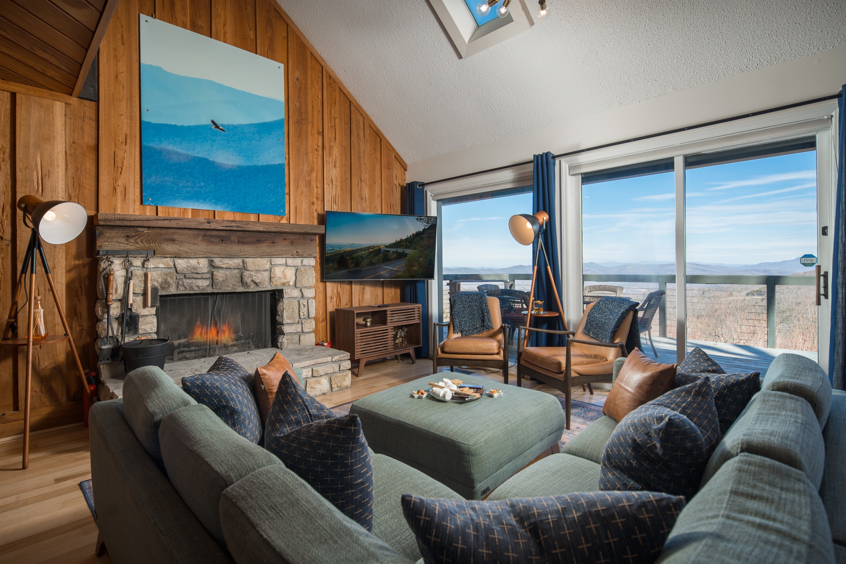 Unwind with a wood burning fireplace (firewood provided in the garage), Roku TV, spacious seating, and beautiful views.