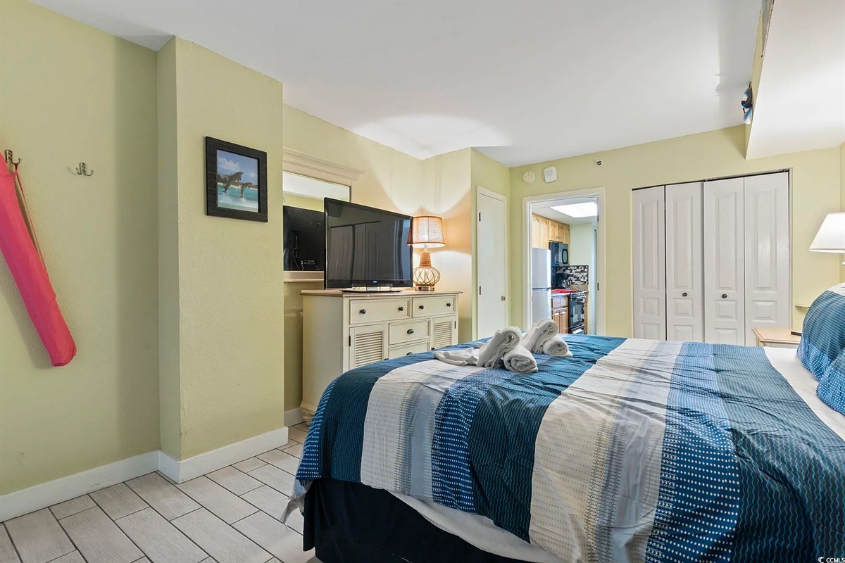 Relax in comfort with soft linens and a calm coastal vibe