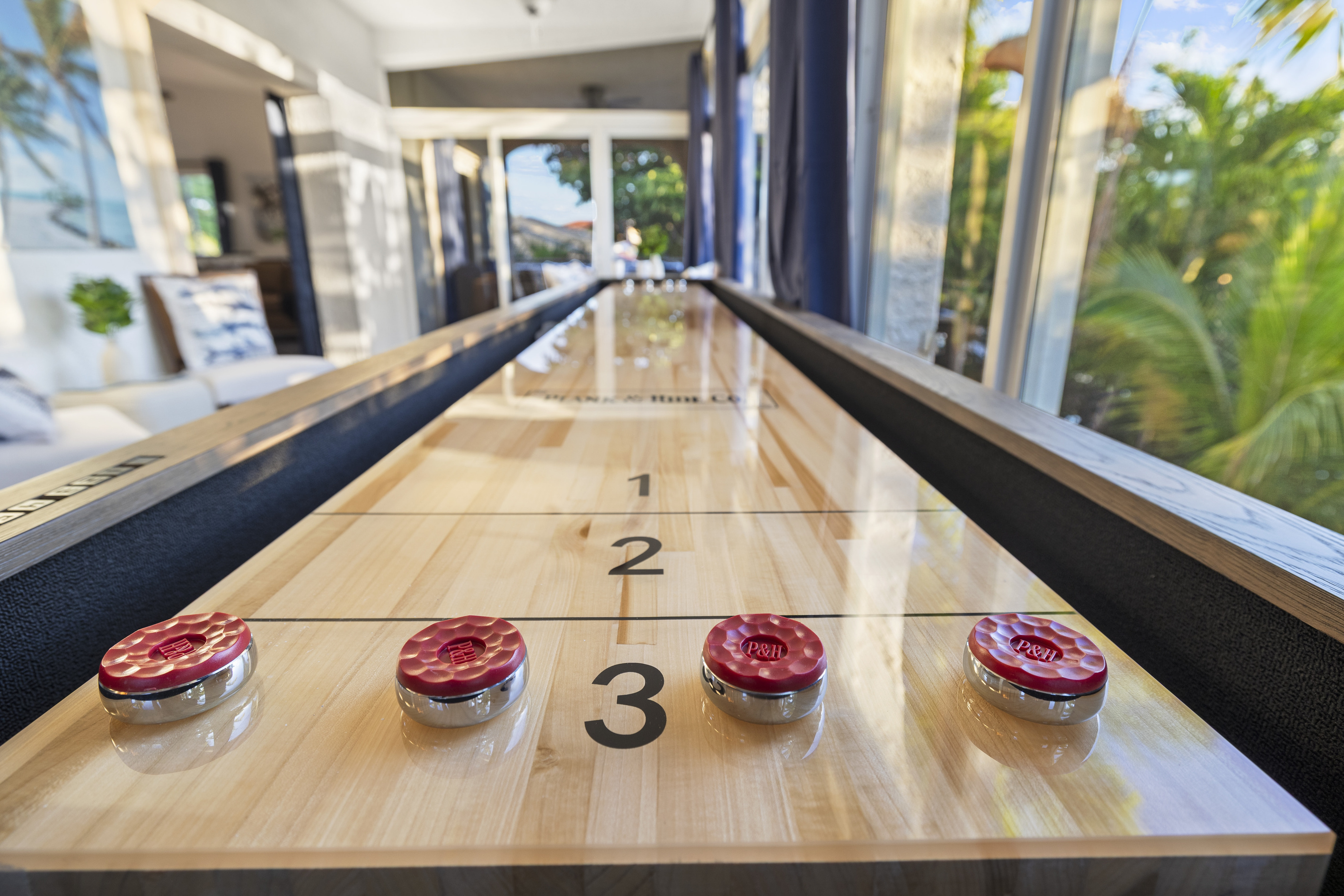 Enjoy a friendly match of shuffleboard.