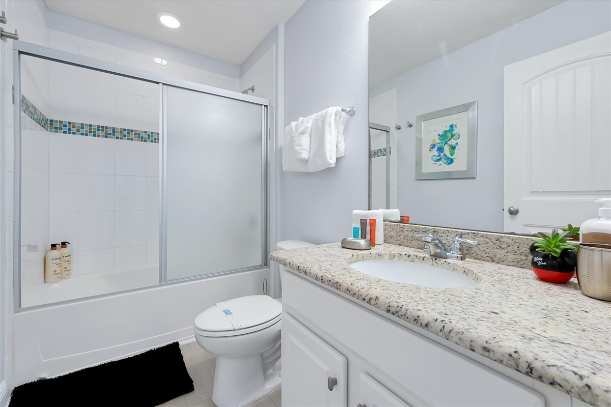 The Mickey bathroom features a tub shower for baths.
