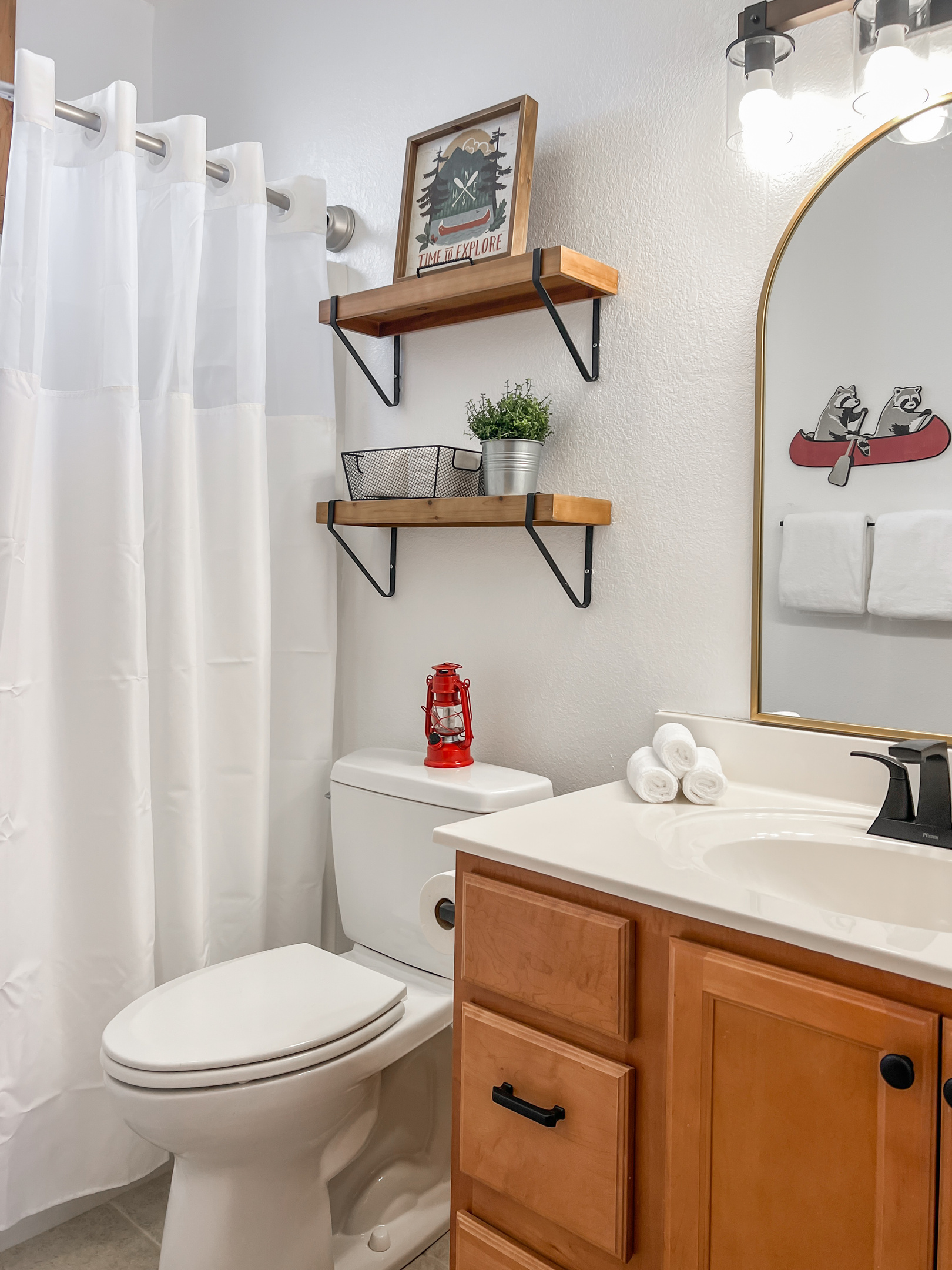 Full bathroom with vanity, toilet and shower, stocked and ready for guests.