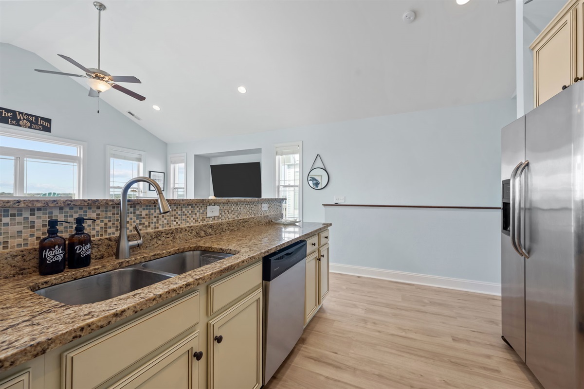 Large double sink, dishwasher and a large fridge - because your space should also be functional and convenient