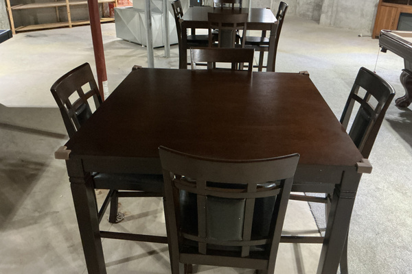 Two high top tables with 8 total chairs/stools