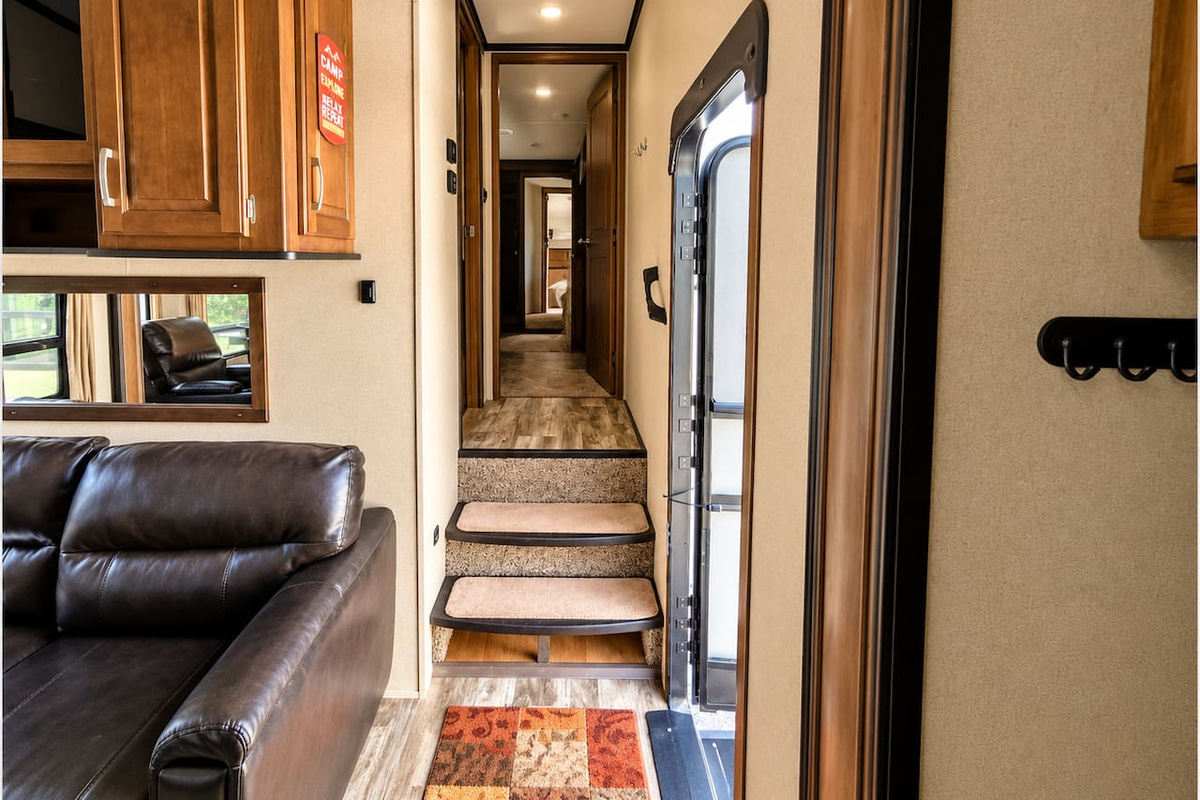 Steps leading up to bathroom and bedroom