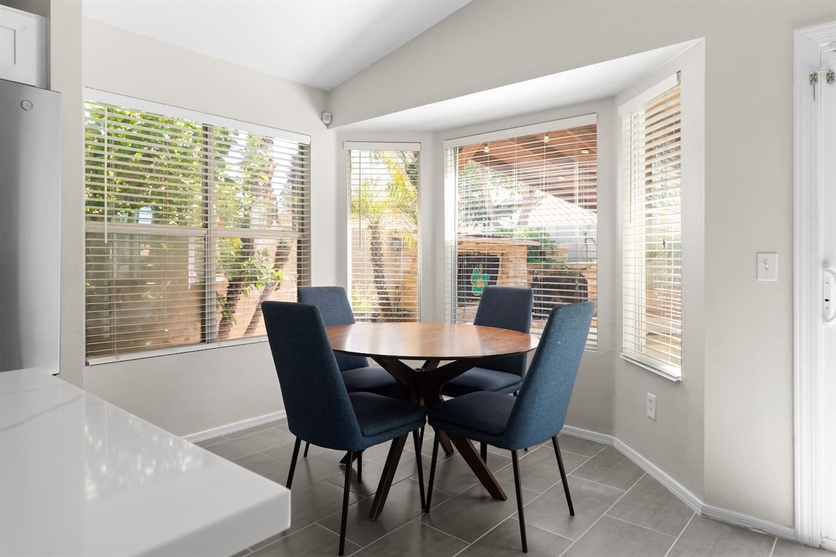 Our cozy dining area is a perfect for enjoying morning coffee or dinner together.