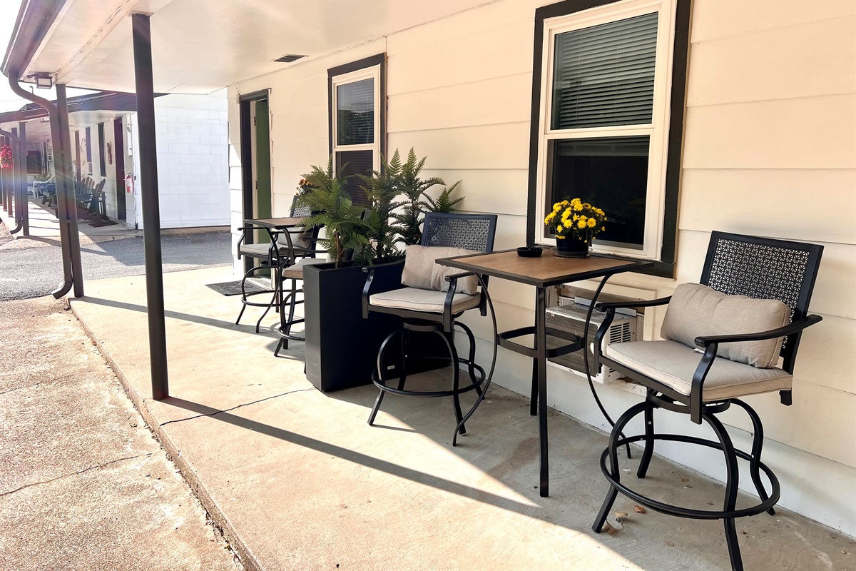 Cozy outdoor seating right outside your door.
