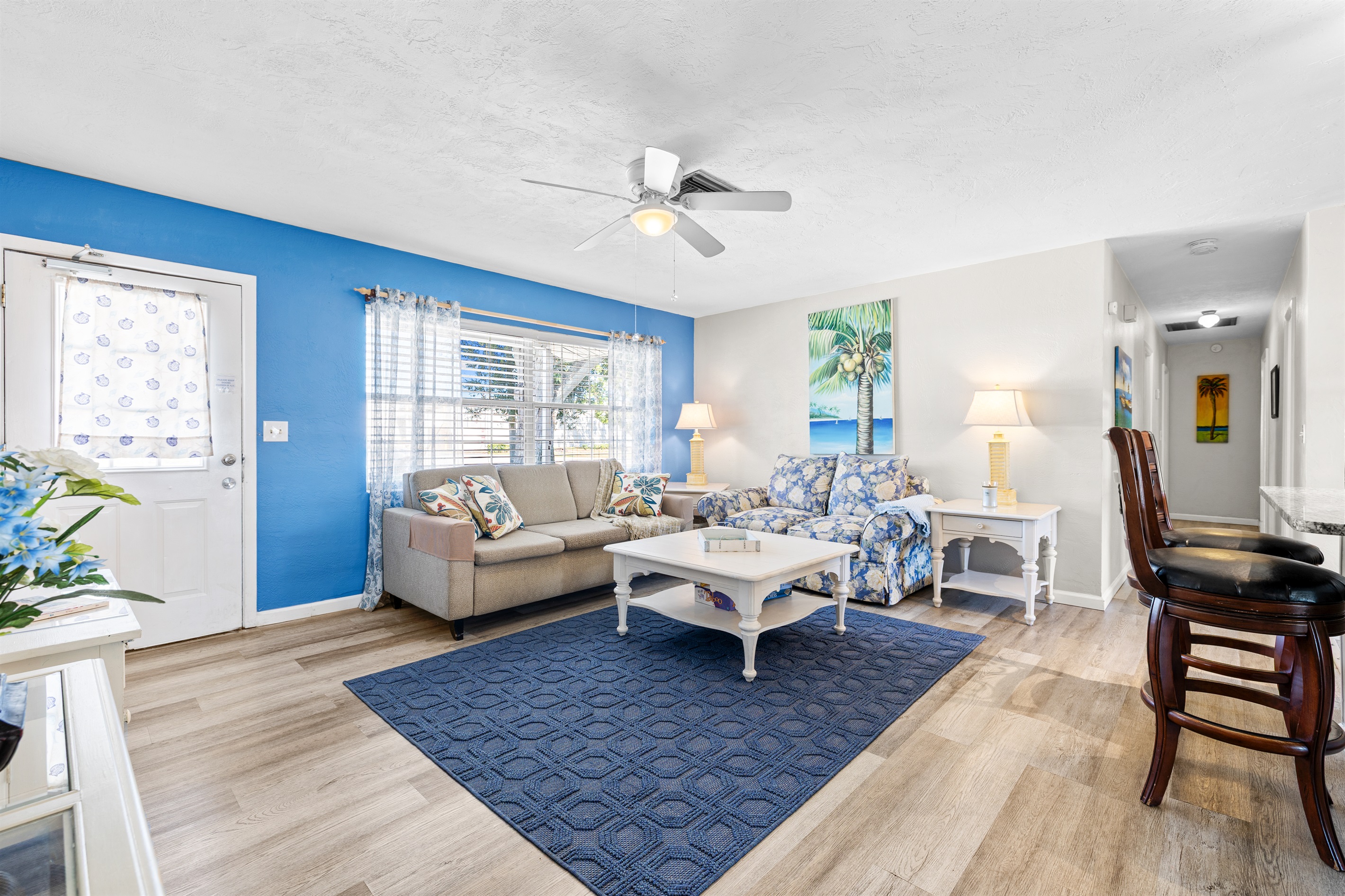 Living room with Roku TV, Games, DVD player w/DVDs, Books and a Guest table with Local Info!   Queen size MEMORY FOAM sofa bed! 