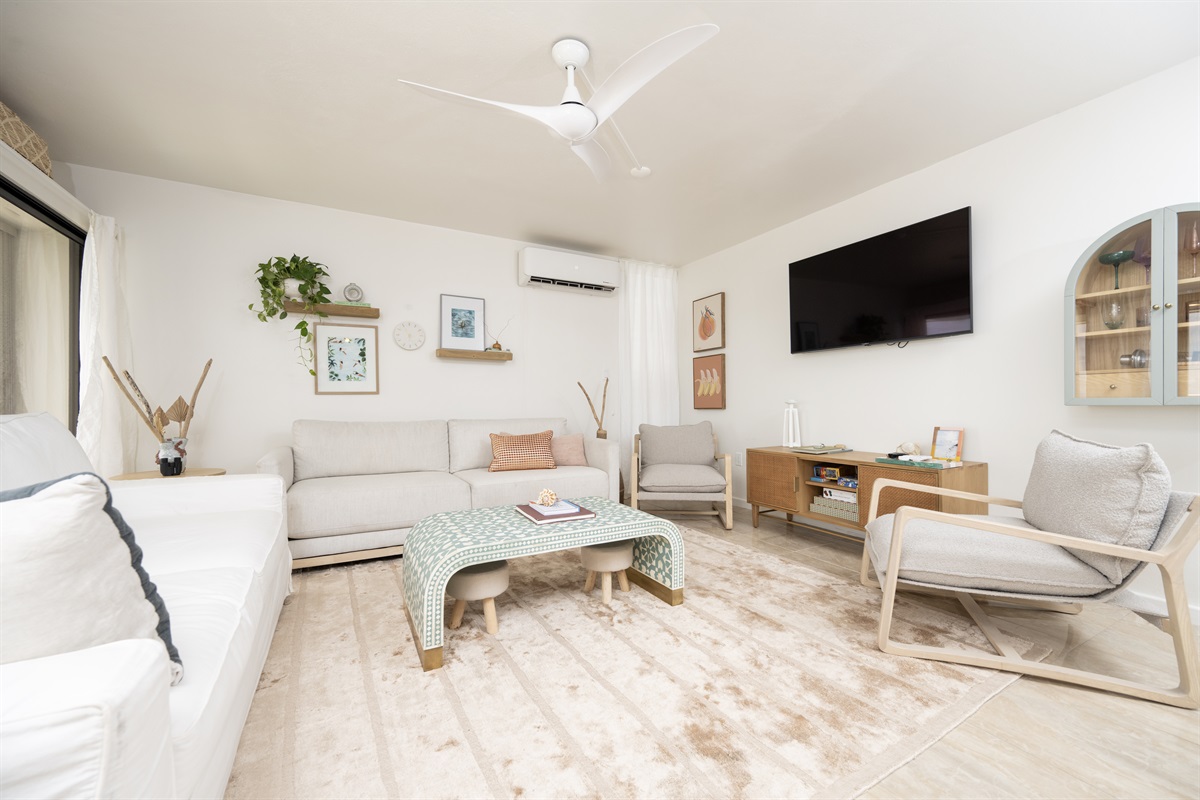 Cozy up in the spacious living room after a day of island adventures.