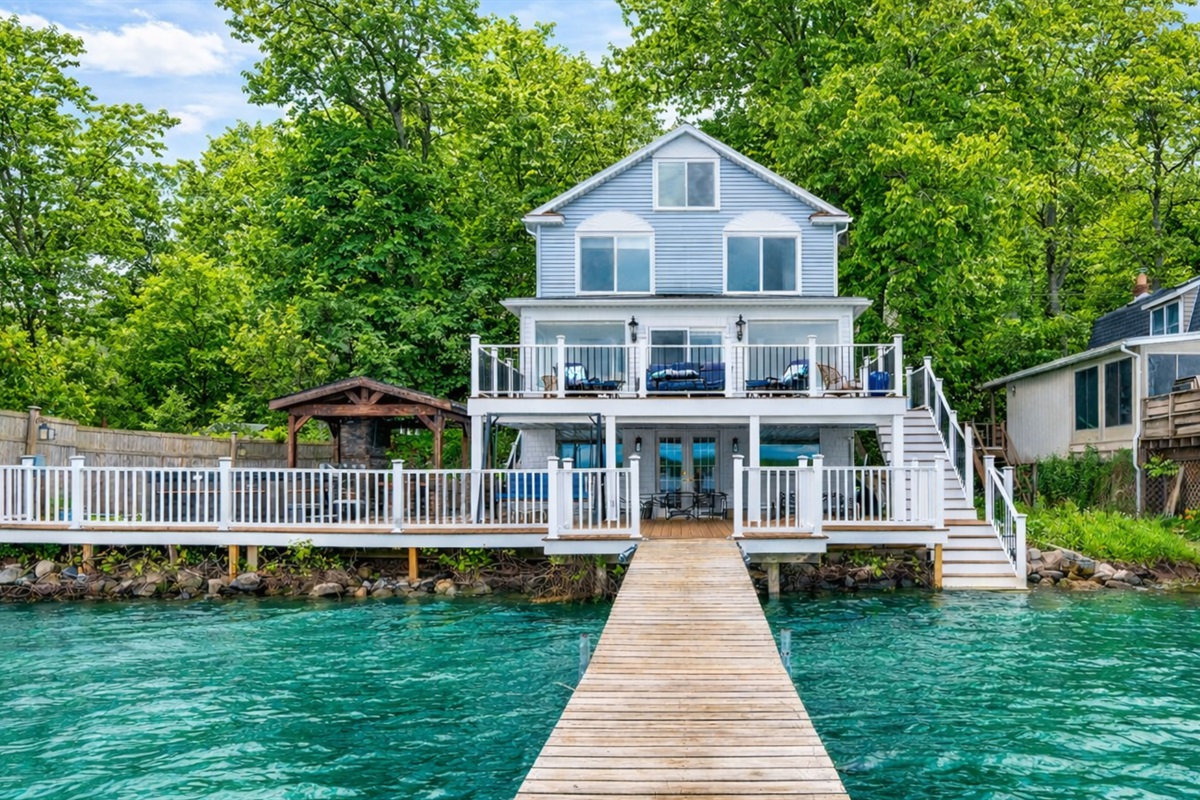 Spacious lakefront home with multi-level decks, perfect for relaxing or entertaining by the water.