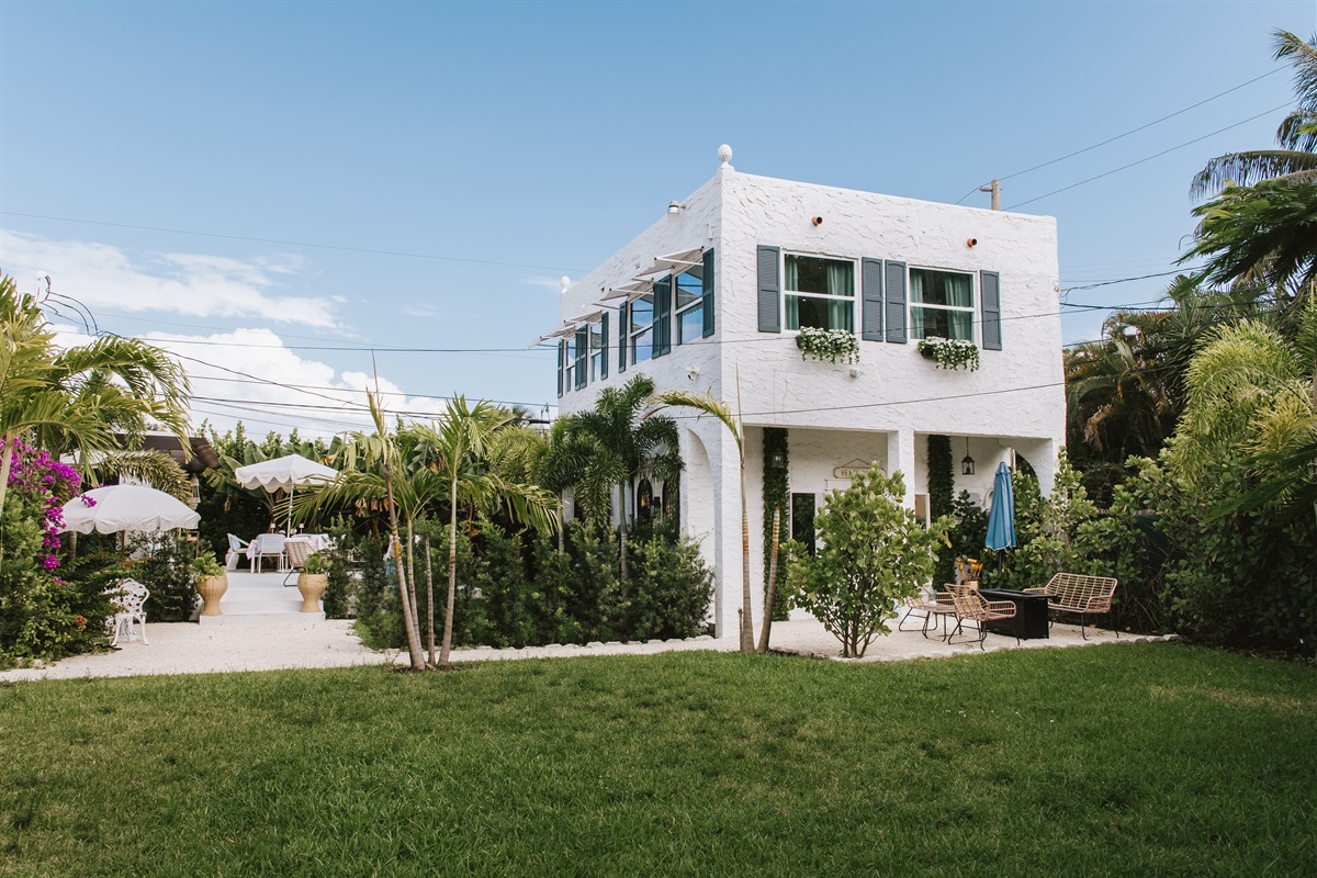 A view of the rear cottage from across the lawn, illustrating how spacious and peaceful our grounds are.