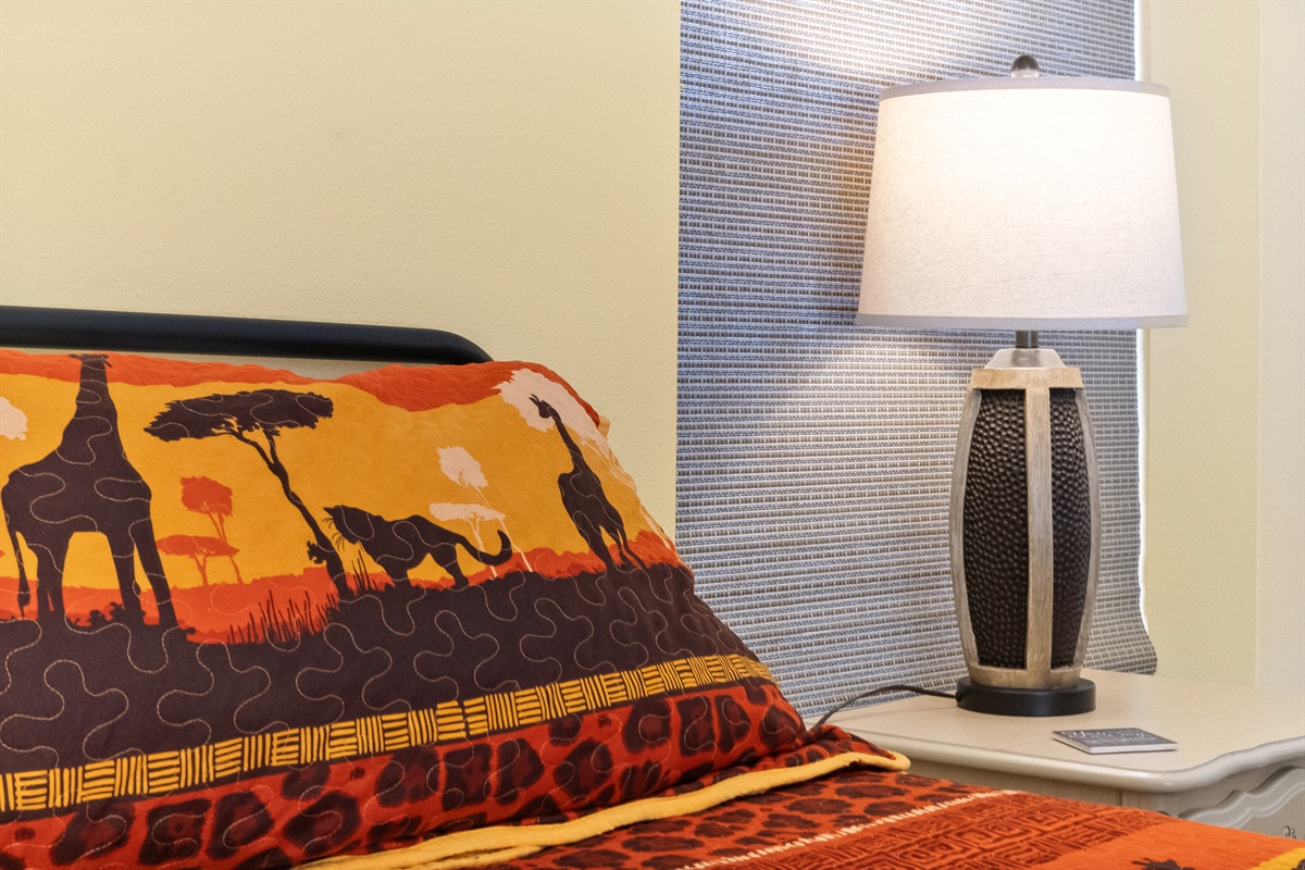 All of our beds feature quilts for Florida comfort. The lamps have USB ports for charging.