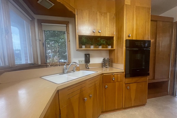Original 1955 kitchen with updated appliances throughout.