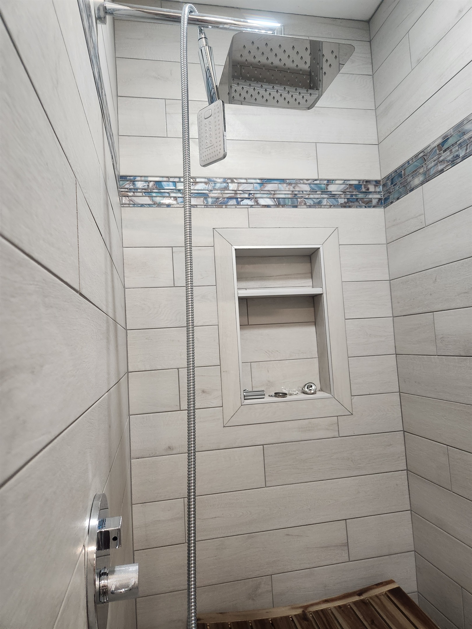Rain shower and massage sprayer in master showers