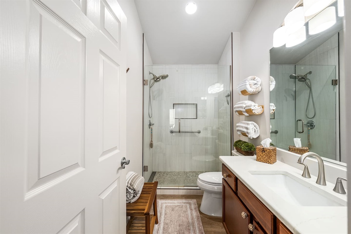 No, it isn't the spa, but it sure feels like it!  The guest bathroom has been recently updated and features a large vanity and a stunning walk-in shower.  Complimentary shampoo, conditioner, and body wash are provided.