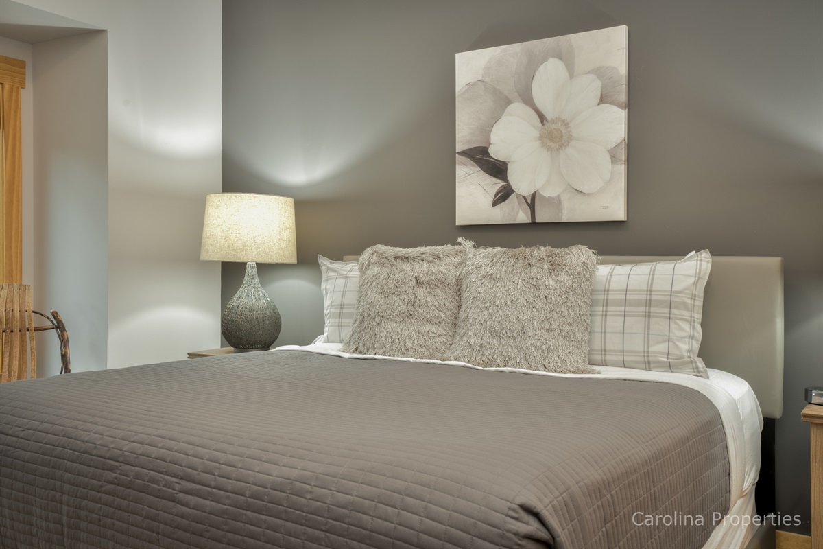 King size bed in master bedroom