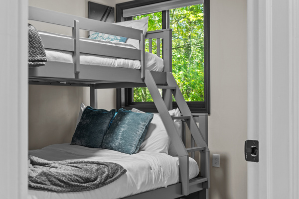Offering comfortable bedding, featuring crisp linens, plush pillows, and cozy blankets to guarantee a restful night's sleep