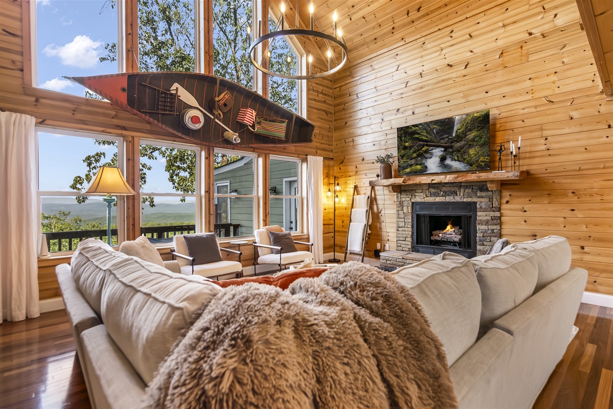Warm and inviting living room with wood burning fireplace