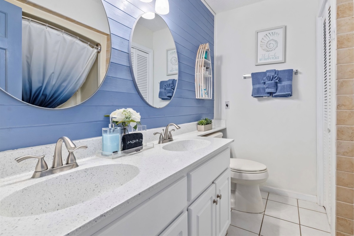 Clean, refresh, and Reset after the beach with a relaxing bath or quick shower. Dual sinks & mirrors make mornings easy. Stocked with soft towels, hair dryer, and essential body wash & hair care