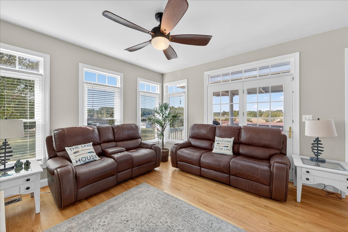 Bright sunroom perfect for morning coffee or evening chats.