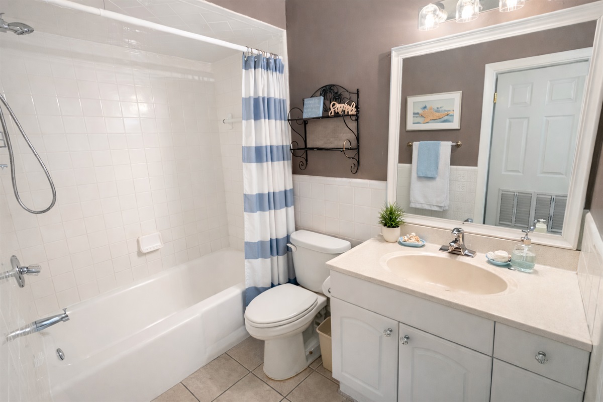 Full bathroom near guest bedroom