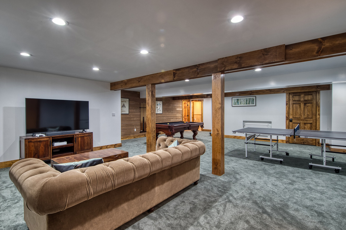 The finished lower level is designed for entertainment with games, movies, and space to spread out.