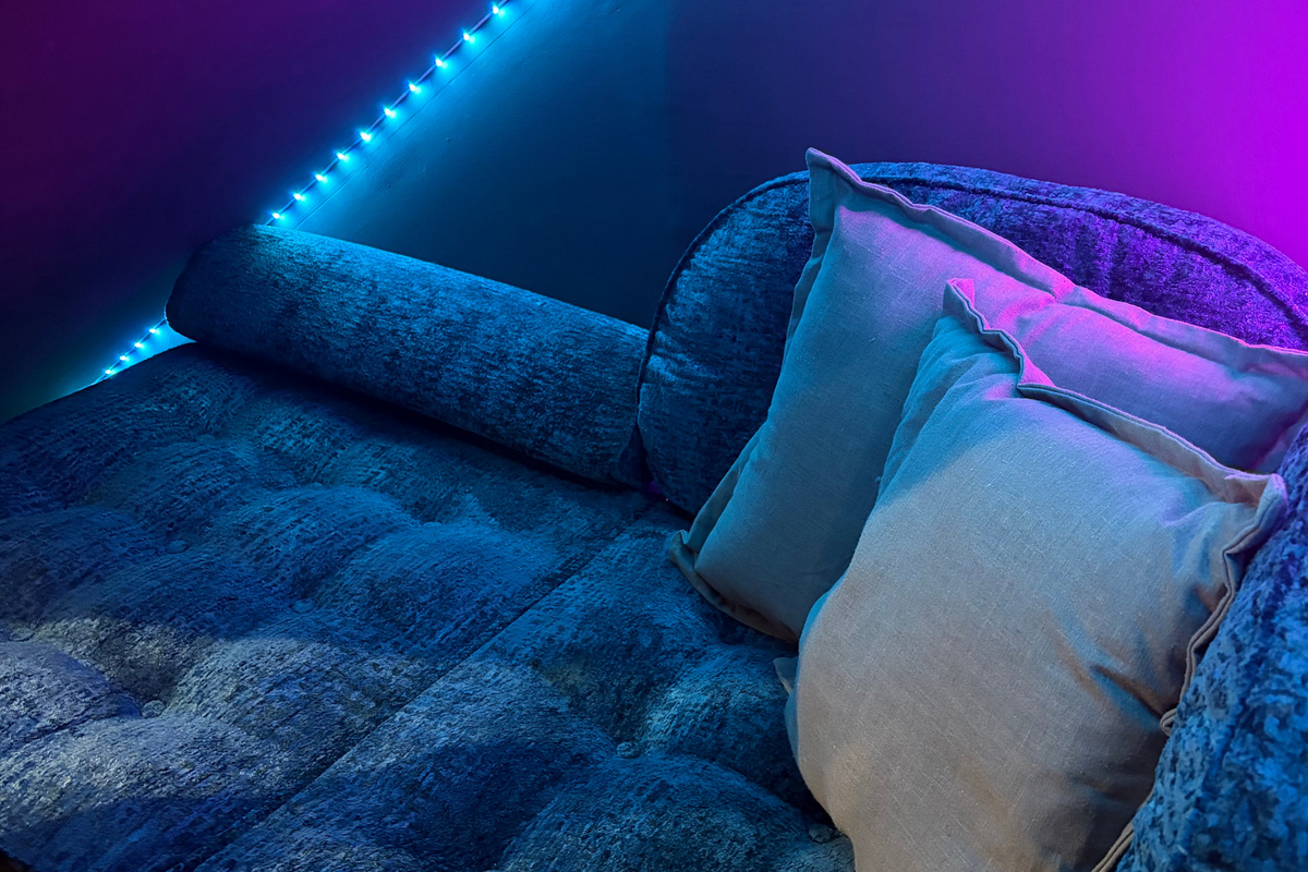 A cozy LED-lit nook that's a favorite hangout for kids and teens. This area includes two comfortable memory foam floor mattresses that convert to chairs.
