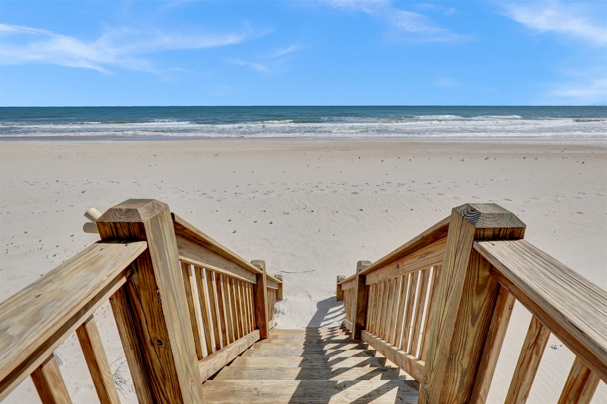 Your private boardwalk steps—the only thing between you and the Atlantic.