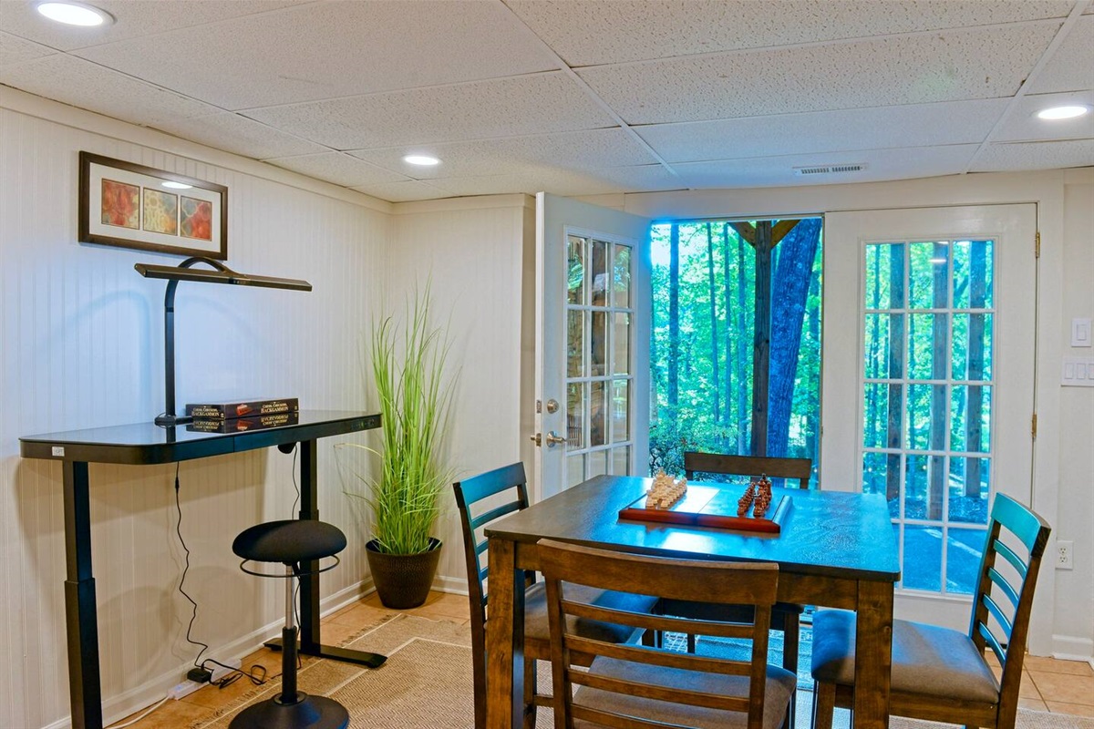 Our electric Sit/Stand desk makes a great work space, right next to the great outdoors!Basement level