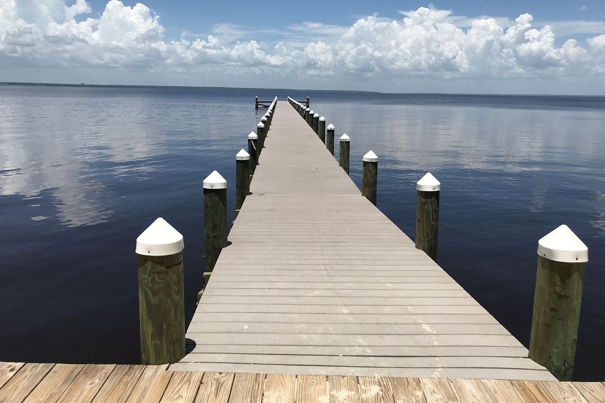 Take a peaceful walk along the pier and enjoy sweeping views of the calm bay waters and endless sky. This quiet waterfront setting is perfect for fishing, sightseeing, or simply soaking in the beauty of the coast.