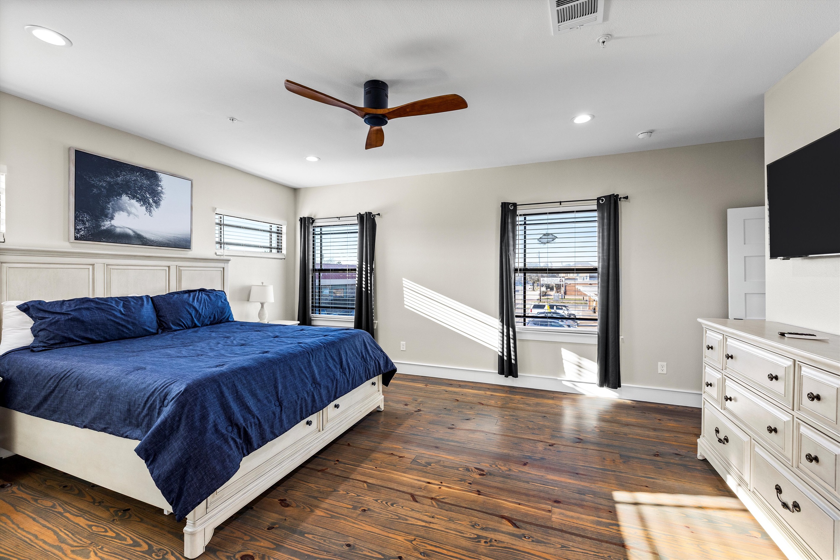 Primary Bedroom: Bright and airy retreat with elegant furnishings and stunning natural light!