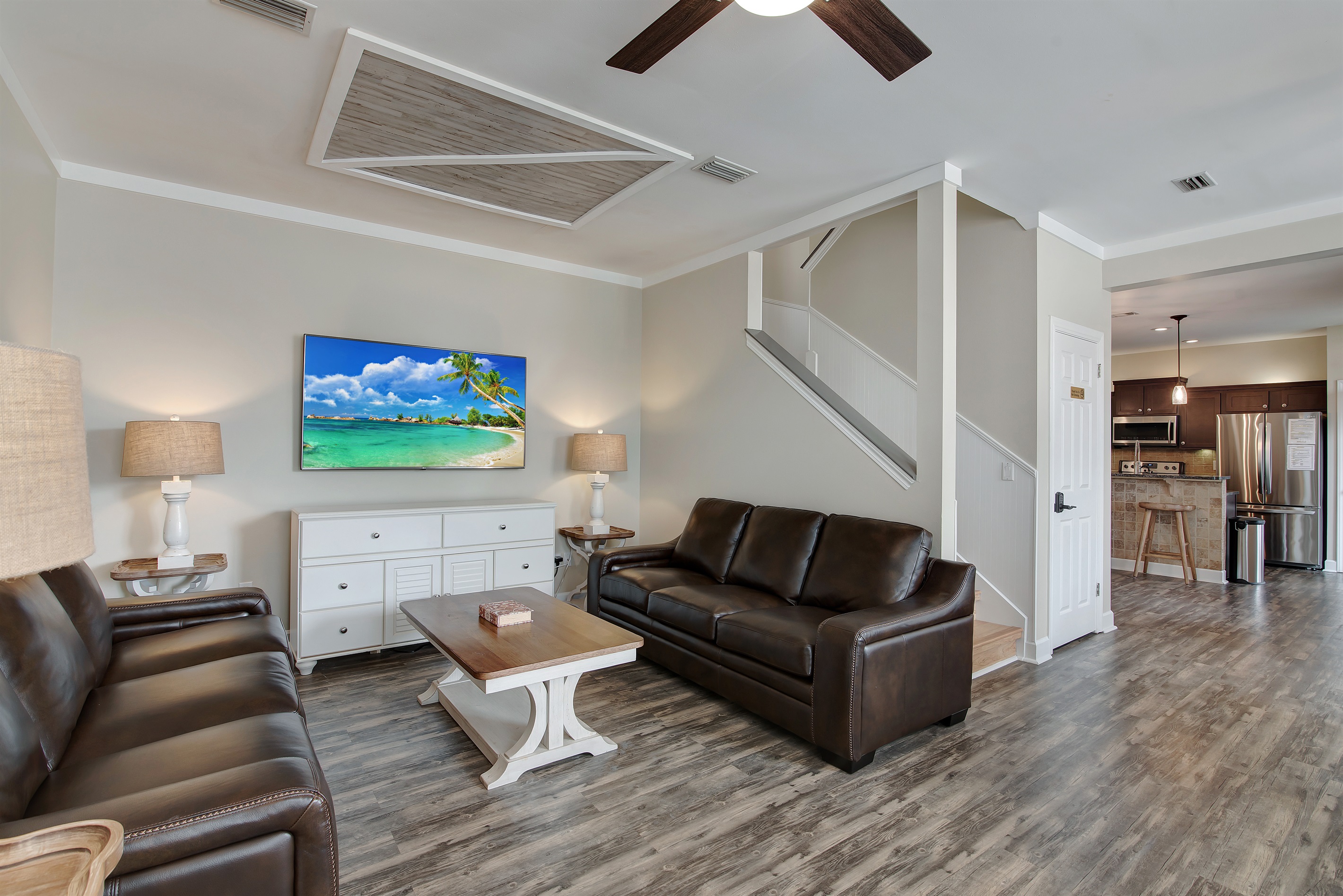 Spacious living area with Smart TV and open layout