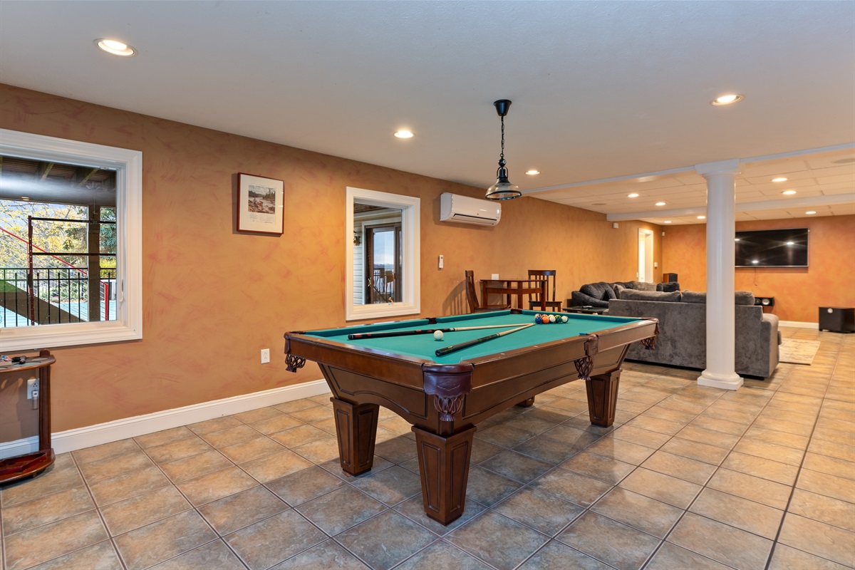 Lower level living room with bar and pool table