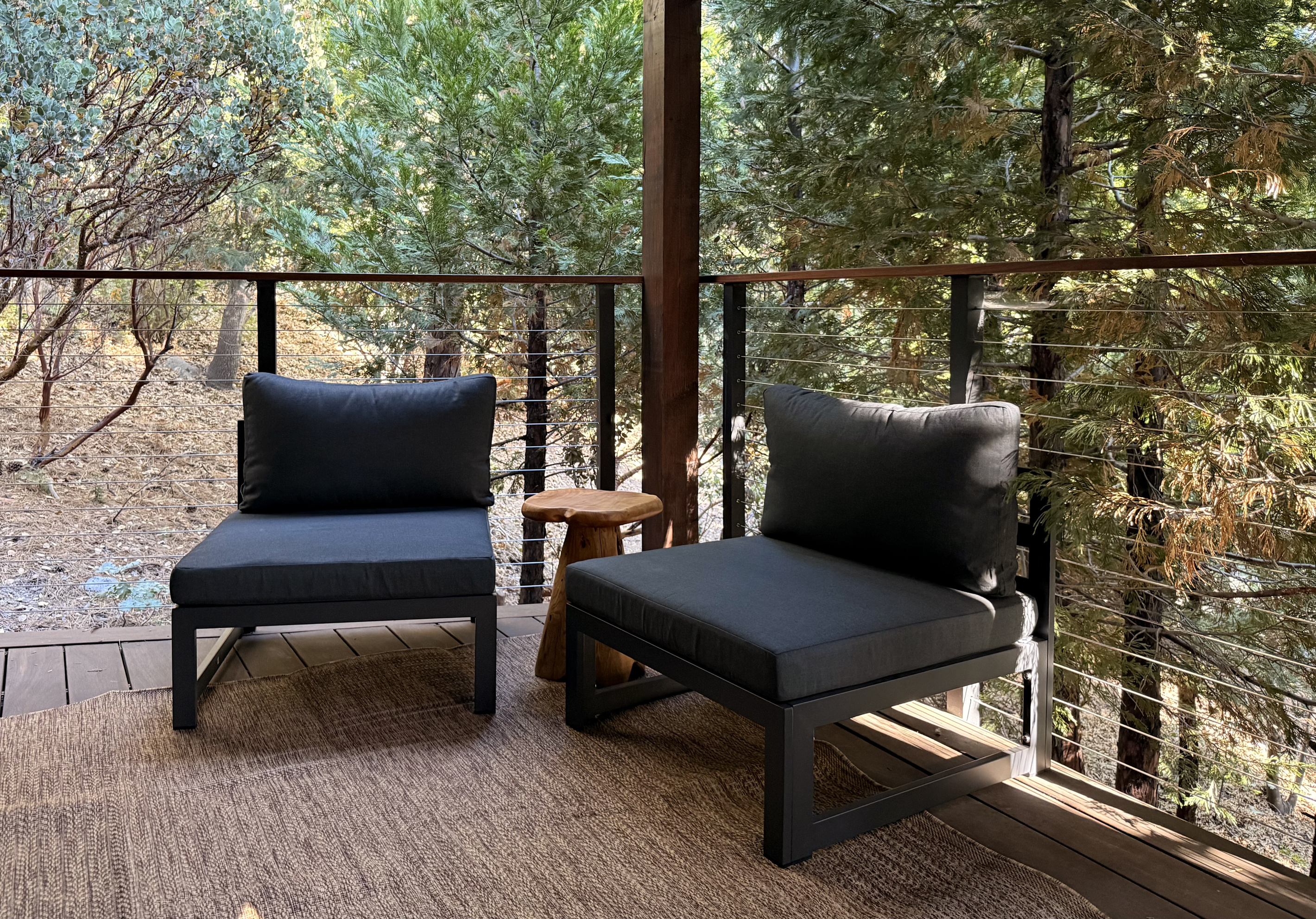 Quiet and private space to enjoy your coffe amongst the trees on the lower deck.