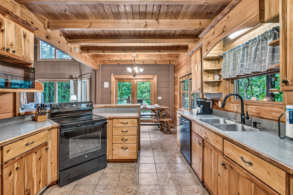 Seamless connection between the kitchen, dining table, and main living space.